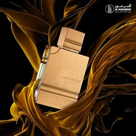 Perfume Al Haramain Amber Oud Gold Edition, frasco dourado luxuoso, fragrância oriental gourmand com bergamota, melão, notas doces e baunilha.